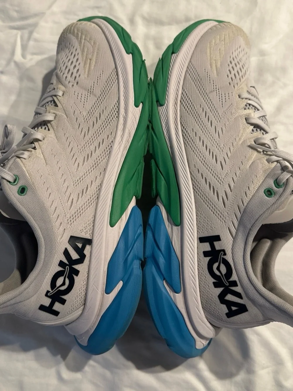 Hoka Men's White Running Shoes with Green and Blue Soles